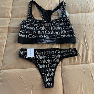 - (3) Piece Calvin Klein Set Women